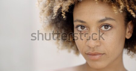 Girl Putting Make Up On Lips Stock photo © dash