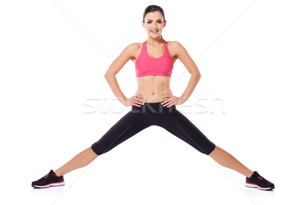 Beautiful young athlete posing in sportswear Stock photo © dash