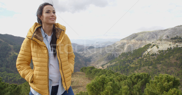 Smiling woman appreciating the peace of nature Stock photo © dash