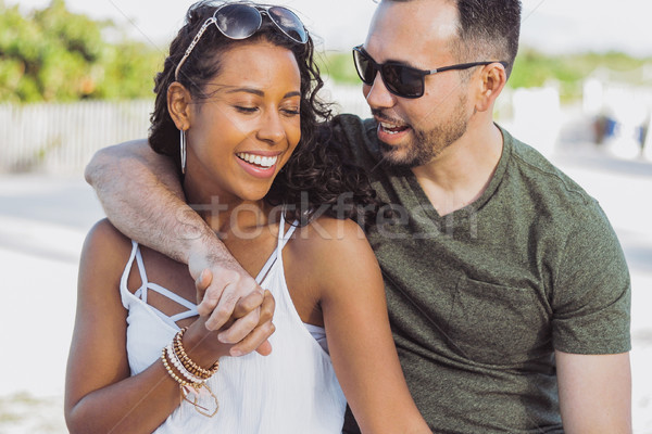 Beautiful couple embracing on shoreline Stock photo © dash
