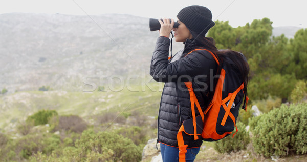 Young woman hiking on a misty day Stock photo © dash