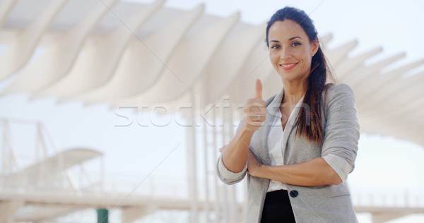 Motivado jóvenes mujer de negocios gesto Foto stock © dash