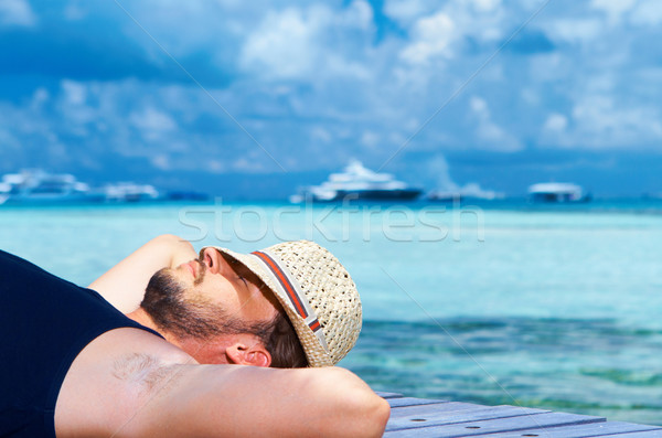 Hombre Maldivas hombre guapo agua playa Foto stock © dash