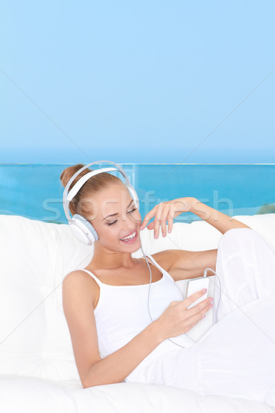Cute женщину наушники расслабляющая Сток-фото © dash