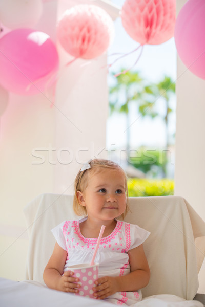 Smiling Little Girl Holding Paper Pink Cup Stock photo © dash