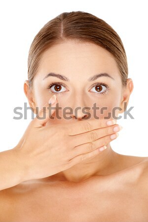Woman with a startled expression Stock photo © dash