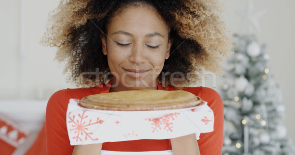 Young woman with a fresh Christmas tart Stock photo © dash
