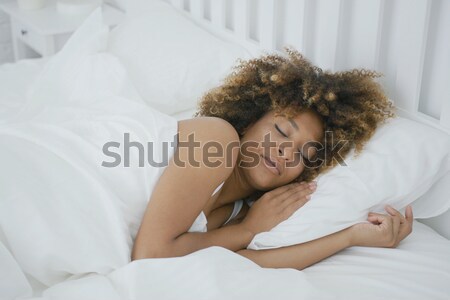 Mujer dormir cama jóvenes encantador Foto stock © dash