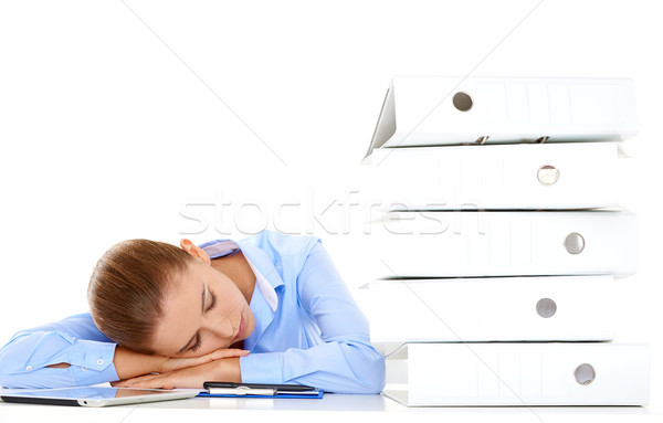 Tired businesswoman asleep at her desk Stock photo © dash