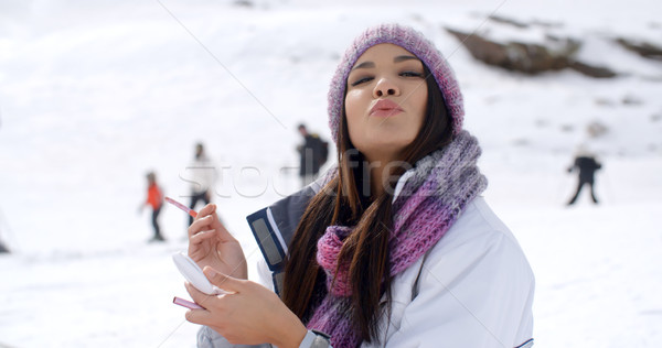 Stock fotó: Fiatal · nő · fúj · csók · kamera · kint · tél