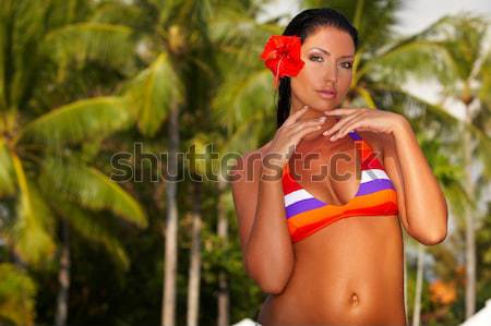 Adorable Slim Girl Posing at Exotic Surroundings Stock photo © dash