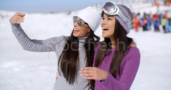 Laughing young woman on winter vacation Stock photo © dash