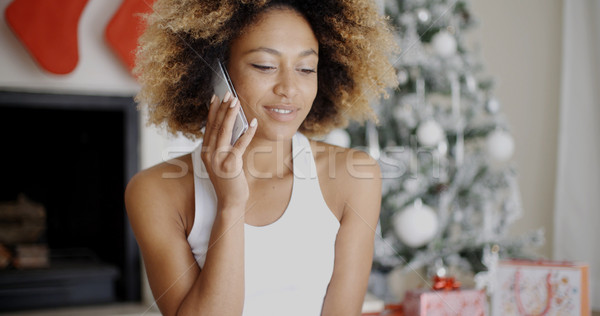 Young woman making a call at Christmas Stock photo © dash
