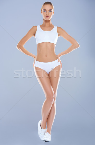 Attractive young woman with perfect body in white underwear Stock photo © dash