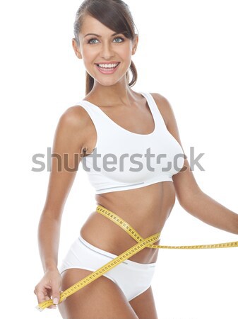 Boldog fitt fiatal nő mér derék vonal Stock fotó © dash
