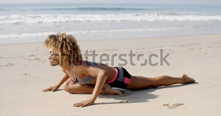 Fiatal lebarnult nő napozás afroamerikai lány Stock fotó © dash