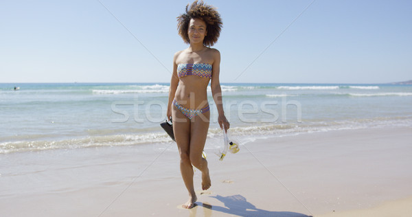 Female with flippers walking on beach Stock photo © dash