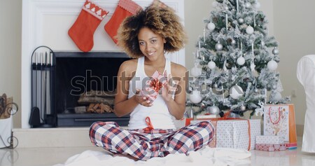 Sexy young woman relaxing on her bed at Christmas Stock photo © dash