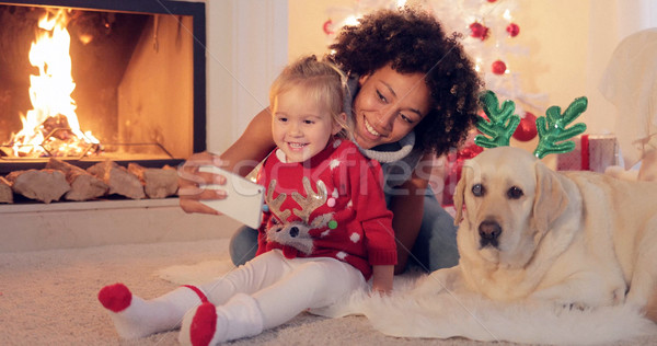 Happy family selfie portrait at Christmas Stock photo © dash