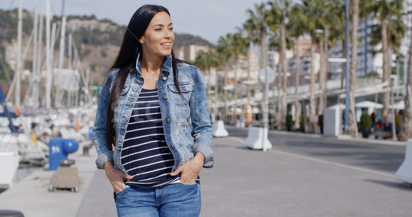 Casual woman enjoying a walk through a marina Stock photo © dash