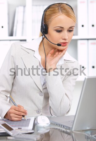 Virtual Customer Service Using Laptop on Table Stock photo © dash