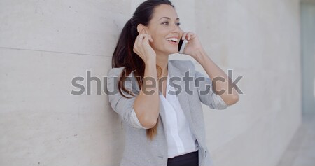 Woman on phone with atonished expression Stock photo © dash