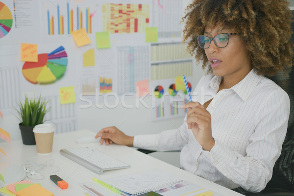 Pensive worker thinking on new project Stock photo © dash