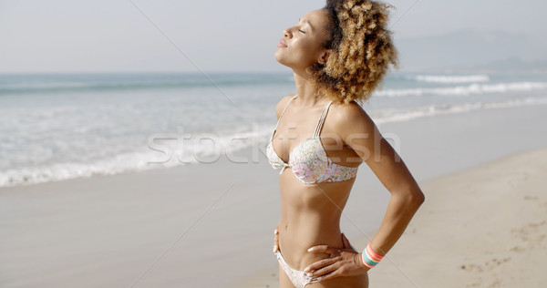 Woman During Sunbath On Tropical Beach Stock photo © dash
