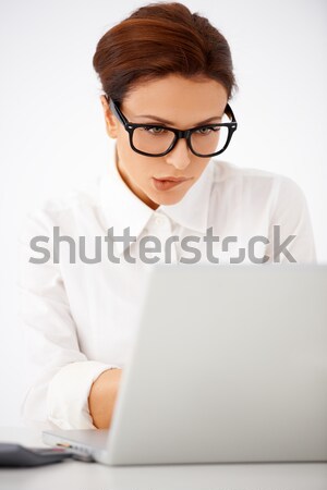 серьезный служба женщину набрав ноутбука довольно Сток-фото © dash