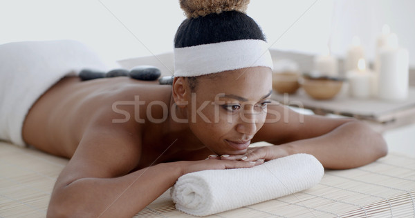 Woman Getting Hot Stones Massage At Spa Stock photo © dash