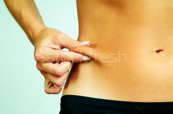 Fitness degete atingere parti ale corpului fată corp Imagine de stoc © dash