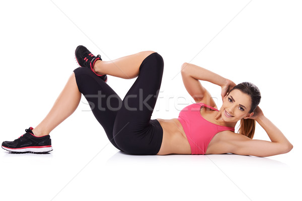 Beautiful young woman doing exercises Stock photo © dash