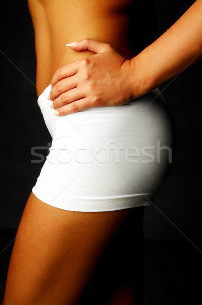 Imagine de stoc: Femeie · de · fitness · degete · atingere · parti · ale · corpului · fată · corp