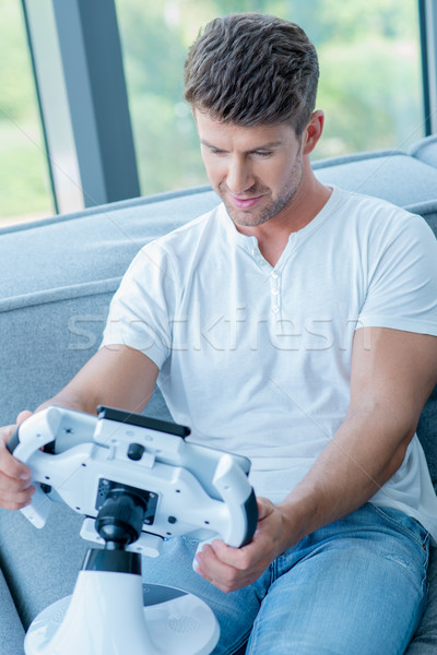 Middle Age Caucasian Man Playing His Cool Gadget Stock photo © dash