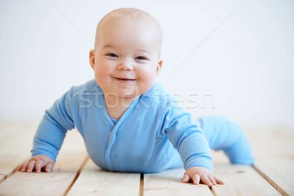 Happy baby with a beaming smile Stock photo © dash
