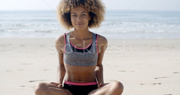 Fit Woman Sits On The Beach Stock photo © dash