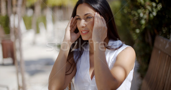Young woman suffering from a headache Stock photo © dash
