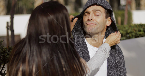 Young man goofing around with his girlfriend Stock photo © dash