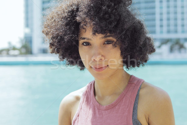 Pretty ethnic woman in sunshine Stock photo © dash