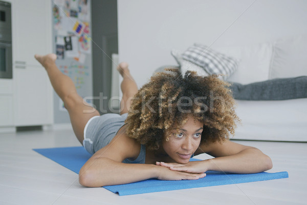 Seriou woman concentrated on workout Stock photo © dash