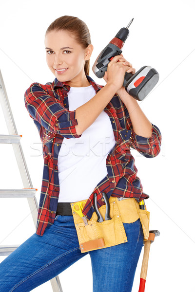 Stock photo: Competent young DIY woman