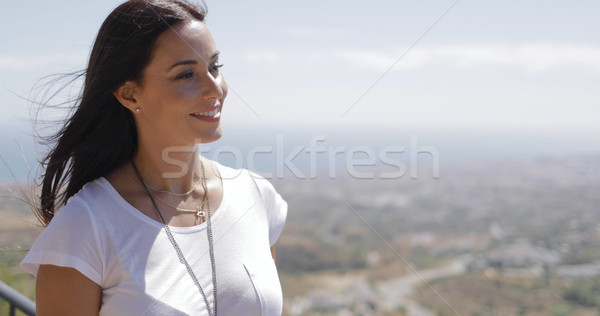 Young brunette enjoying sunlight Stock photo © dash