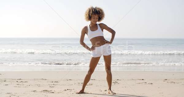 Woman Practices Yoga On A Beach Stock photo © dash