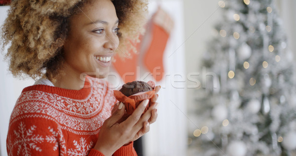 Young woman savoring a Christmas cake Stock photo © dash