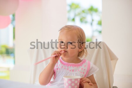 Little Toddler Drinking Juice From Paper Cup Stock photo © dash