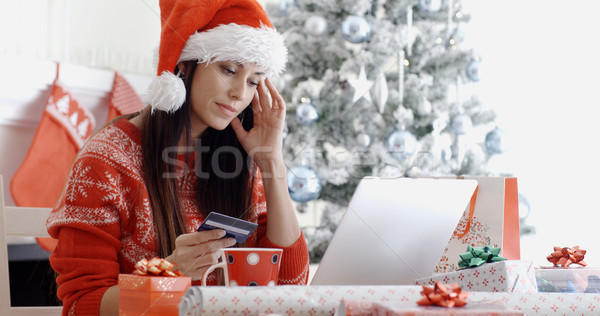 Young woman ordering Christmas gifts online Stock photo © dash