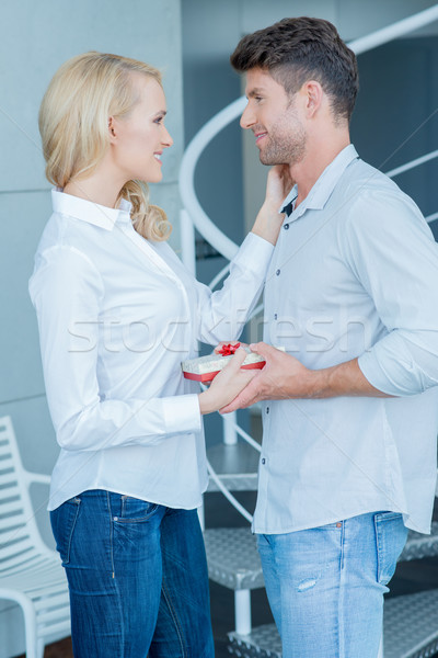 Loving wife giving her husband a Valentines gift Stock photo © dash