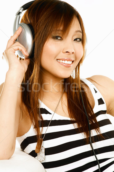 ストックフォト: 音楽を聴く · 小さな · アジア · 美しい · 女性 · 音楽