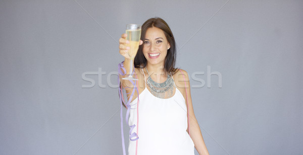 Beautiful chic young woman toasting the New Year Stock photo © dash