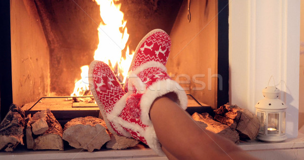 Young woman relaxing in Christmas booties Stock photo © dash